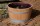 D 70 cm - Weinfass halbiert geschliffen, lackiert mit silbernen Reifen aus Eichenholz Rollen: ohne Rollen, Trageschlaufen: ohne Schlaufen, Ablaufbohrungen: ohne Bohrung (Miniteich)